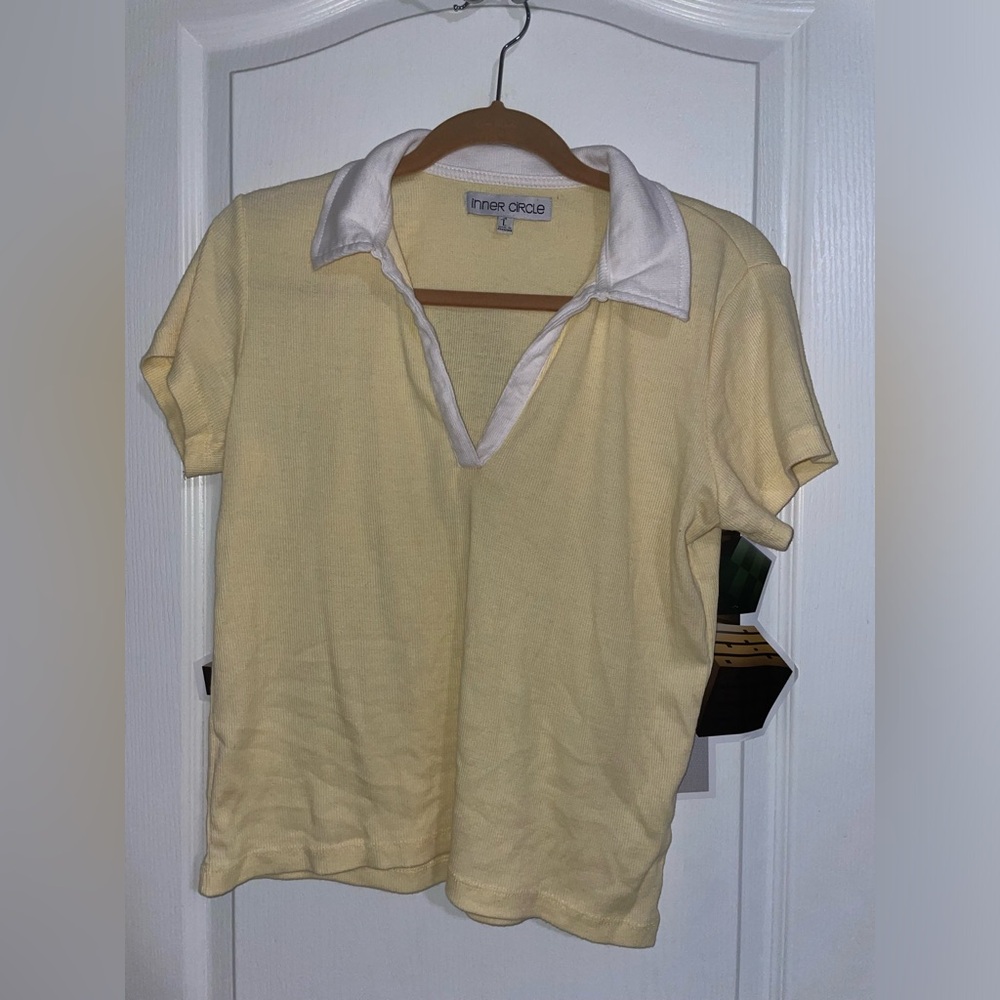 Yellow and white collared shirt